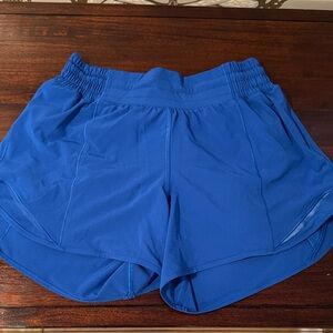 Like new lululemon running shorts. Size 4. Zipper pocket. Bright royal blue.